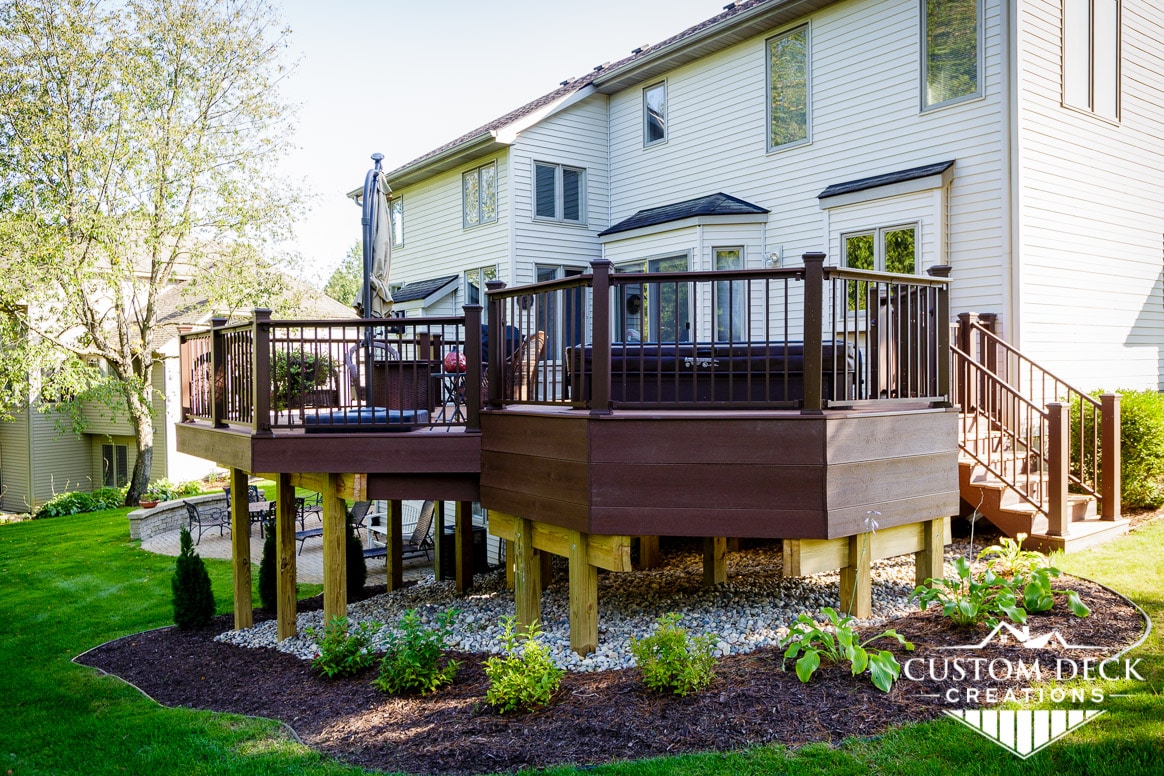 Backyard composite deck with built in hot tub