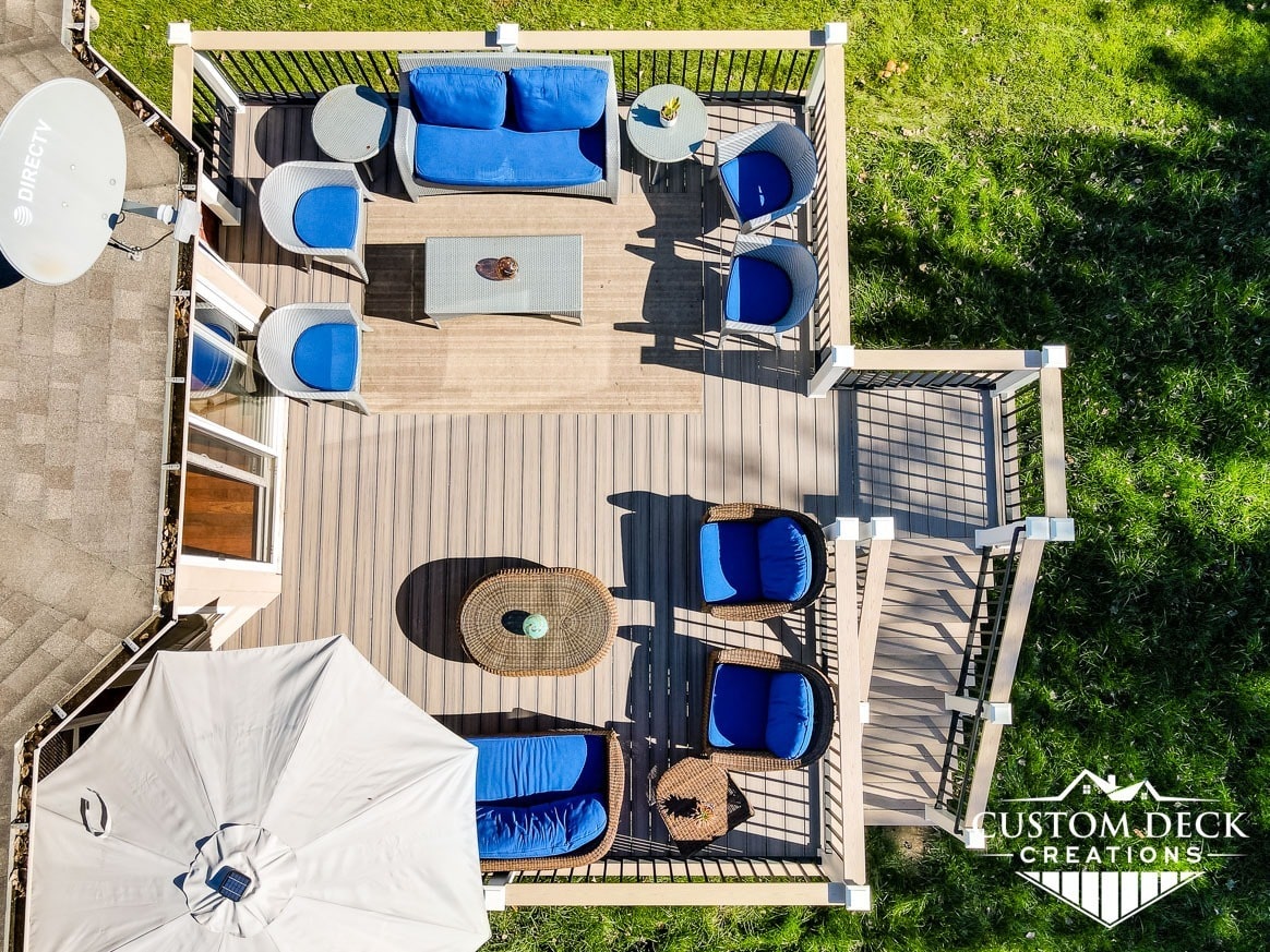 Arial view of a Trex deck with blue furniture