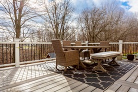 Trex deck in the fall with table and chairs