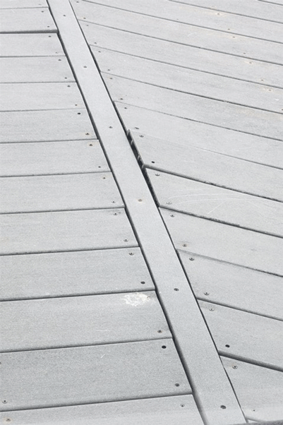 Warping deck boards with visible screws